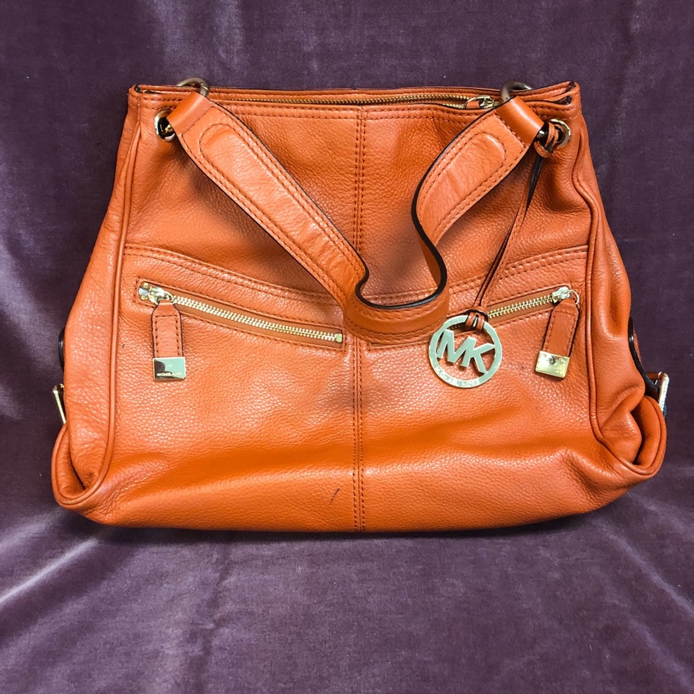 Burnt orange Michael Kors purse